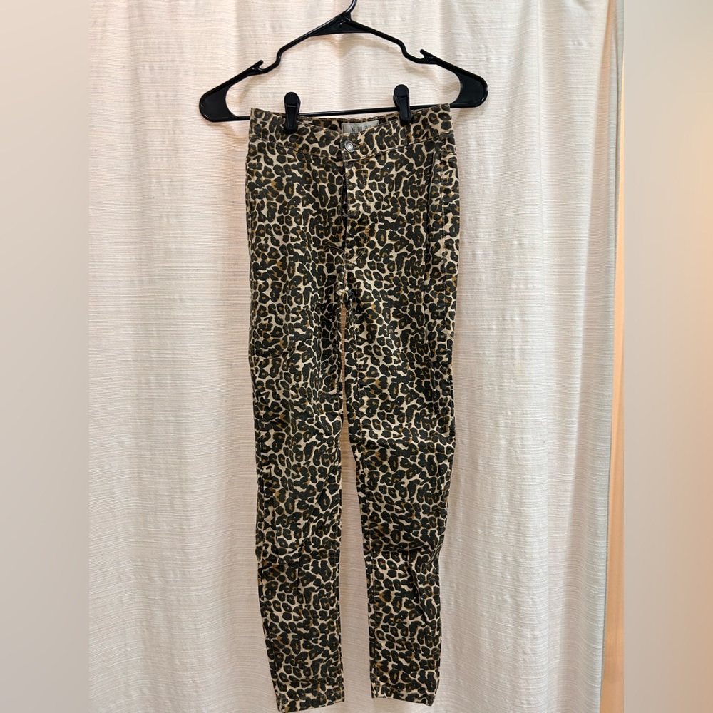 WE THE FREE Cheetah Skinny Jeans